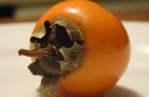 Japanese persimmon, still very much astringent