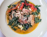 Becker lane farm pork braised in the wood oven with sweet and spicy chiles, Tokyo turnips, and tomatillos. Chez Panisse Cafe, Berkeley, CA.